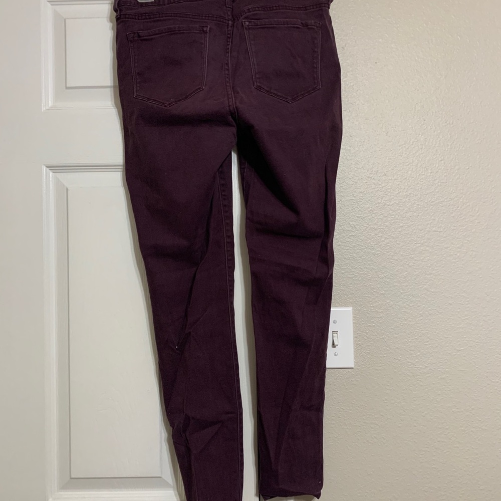 Wine colored mid-rise Rockstar denim